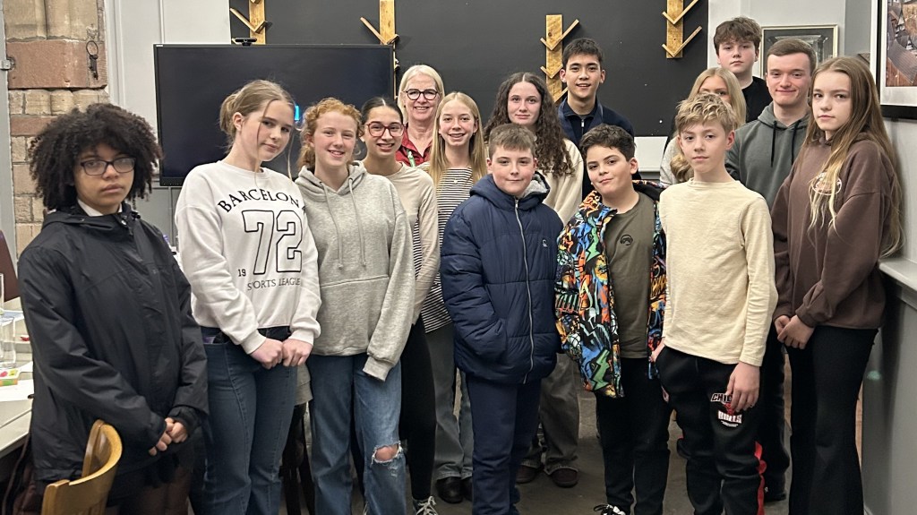 The Youth Council - a group of young people with Cllr Wesley at the back.