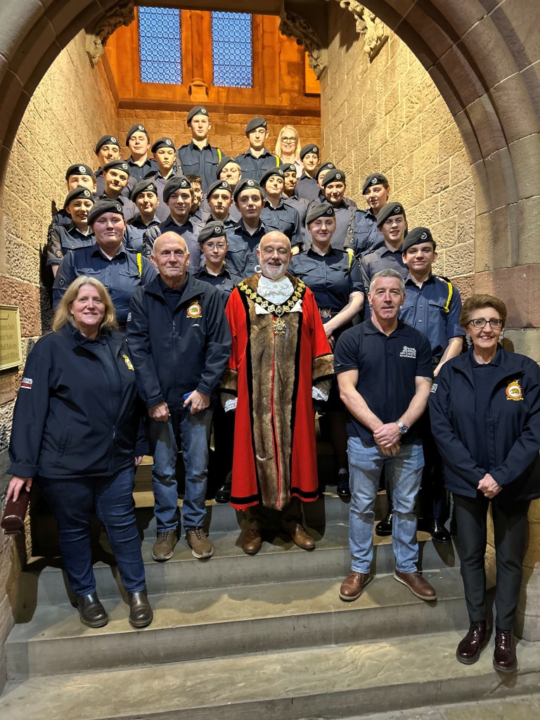 Air Cadets with mayor on stairs of town hall